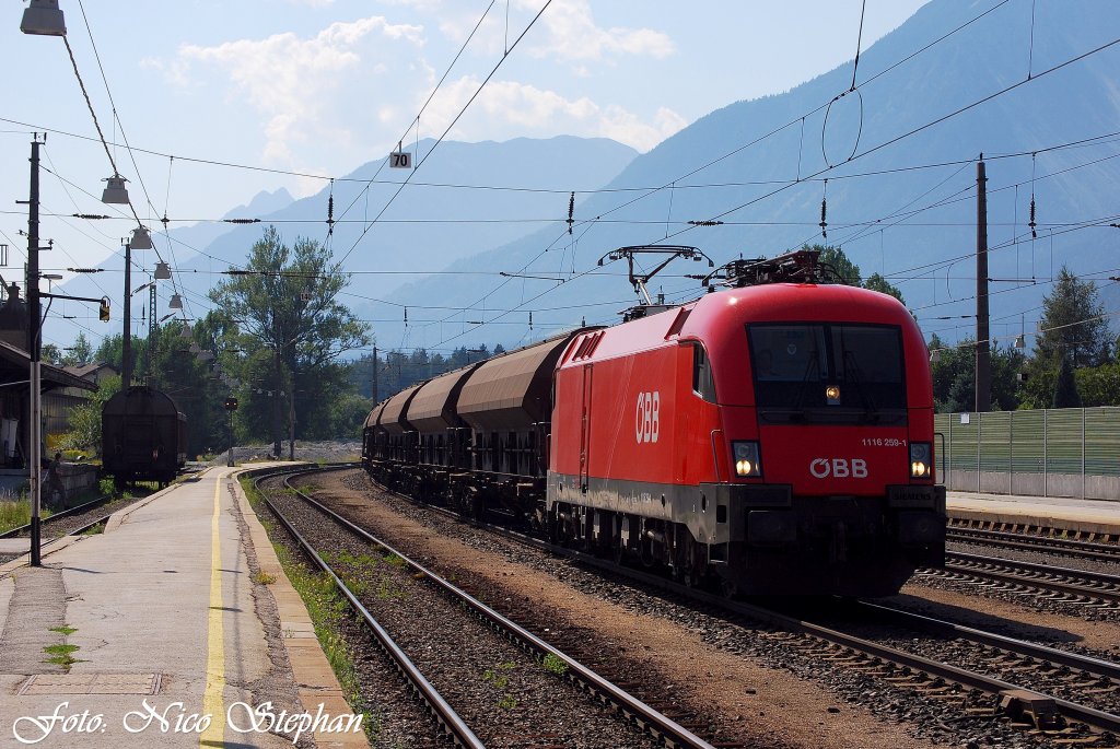 1116 259-1 kam von Innsbruck mit einem langen gemischten Gz her,Brixlegg (sterreichurlaub 20.08.09)
