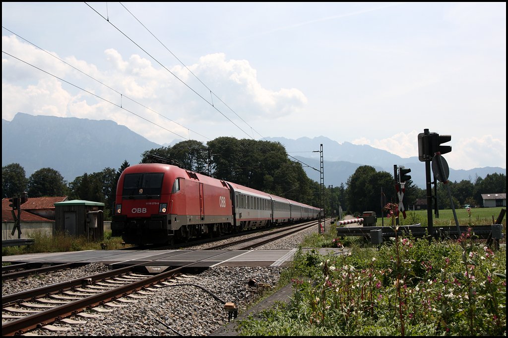 1116 279 ist mit dem OEC 565  Samariterbund  beim Kloster Raisach nach Wien unterwegs. (08.08.2009)
