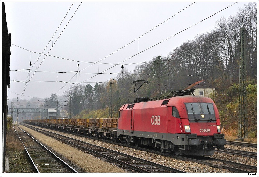 1116.182 mit dem 54033 Richtung Osten. Tullnerbach-Pressbaum, 22.11.2009.