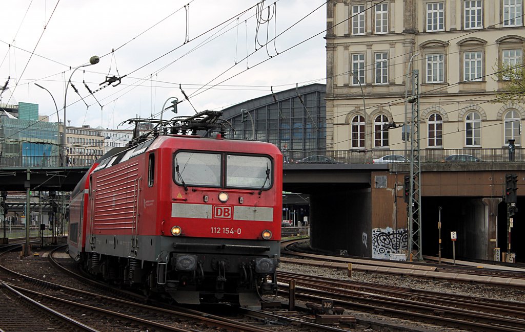 112 154-0 mit RB 21320 von Hamburg Hbf nach Bad Oldesloe bei der Ausfahrt aus Hamburg Hbf am 10.05.2013