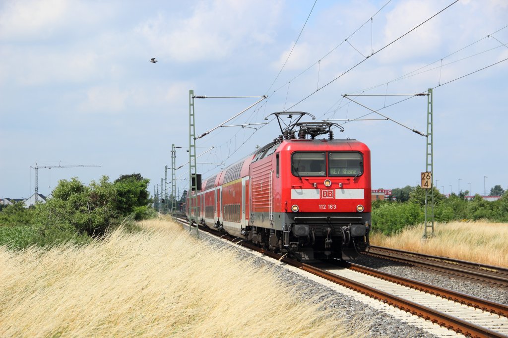 112 163 mit dem RE 7 nach Rheine in Neuss-Allerheiligen am 09.07.2012