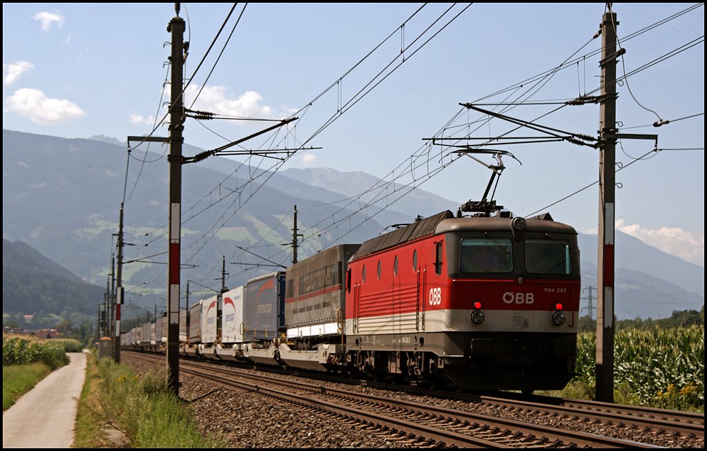 1144 243 (9181 1144 243-3) schiebt den TEC nach. (07.08.2009)