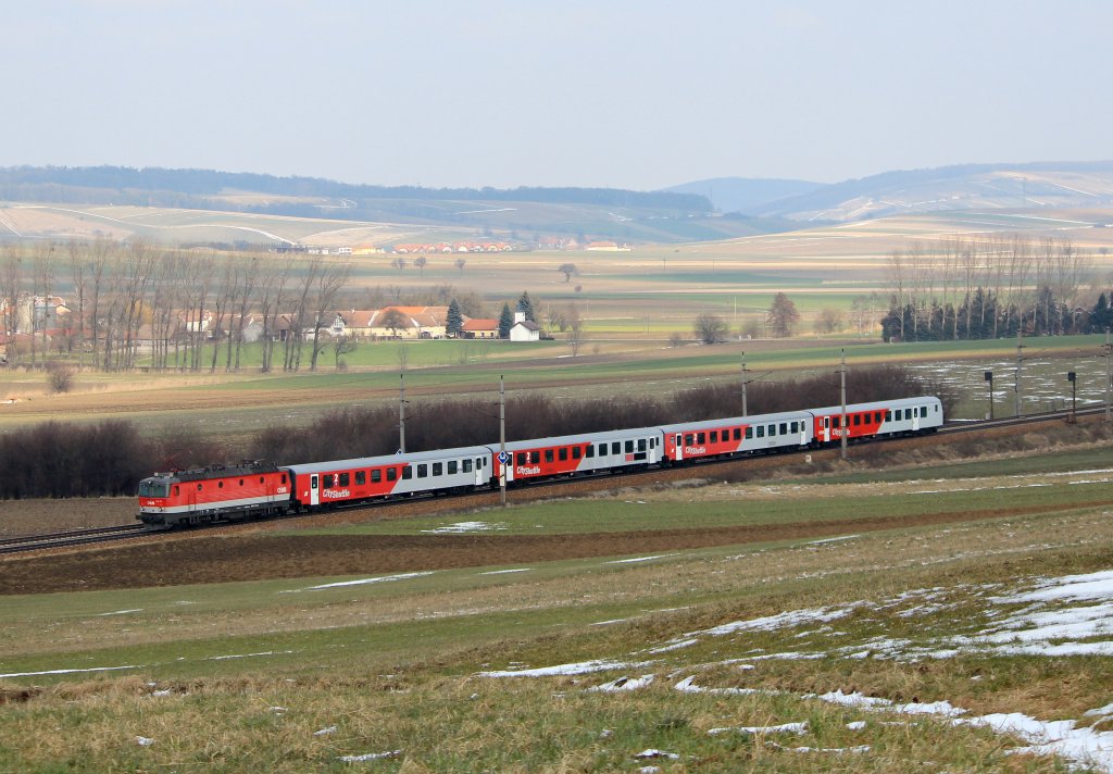 1144 xxx mit einem REX auf dem Weg nach St. Plten, aufgenommen am 16. Mrz 2013 bei Neulengbach.