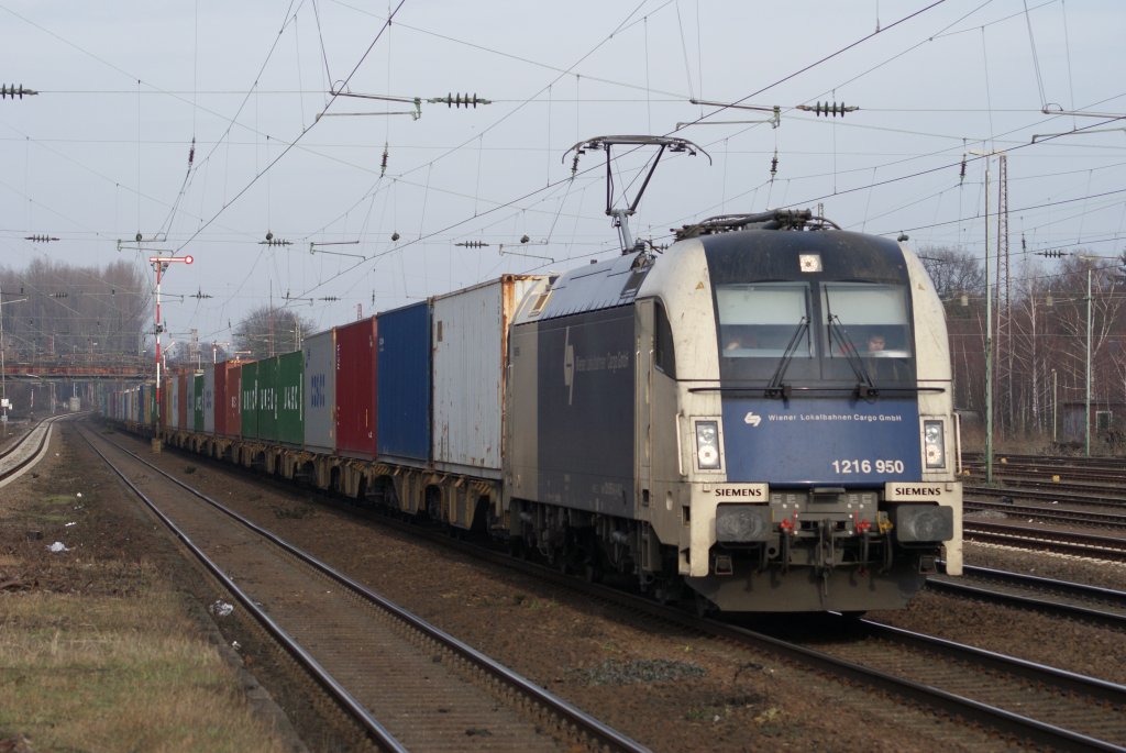 1216 950 mit einem Containerzug in Dsseldorf Rath am 23.01.2010