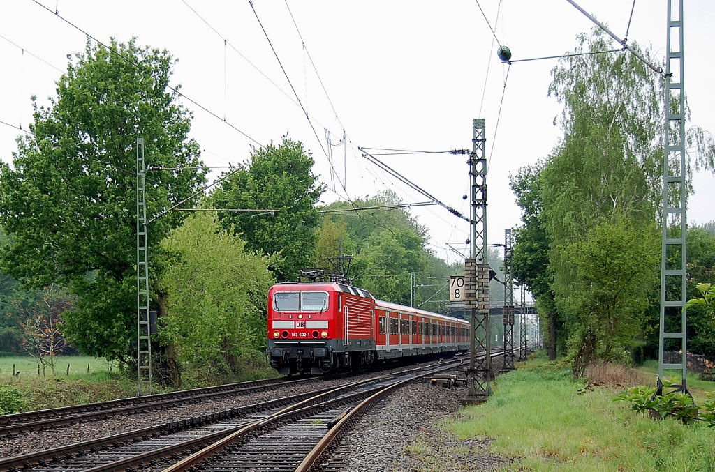 143 602-1 mit S8 Zug in Kleinenbroich. 8.5.2010