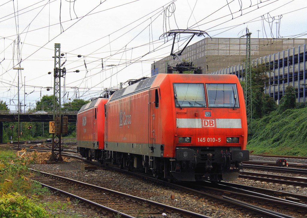 145 010-5 von DB Cargo und 145 001-4 vvon Railion rangiern in  Aachen-West bei Sonne und Wolken am 23.9.2012.