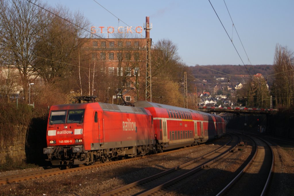 145 036-0 mit dem RE 4 nach Aachen in Wuppertal-Sonnborn am 28.01.2011