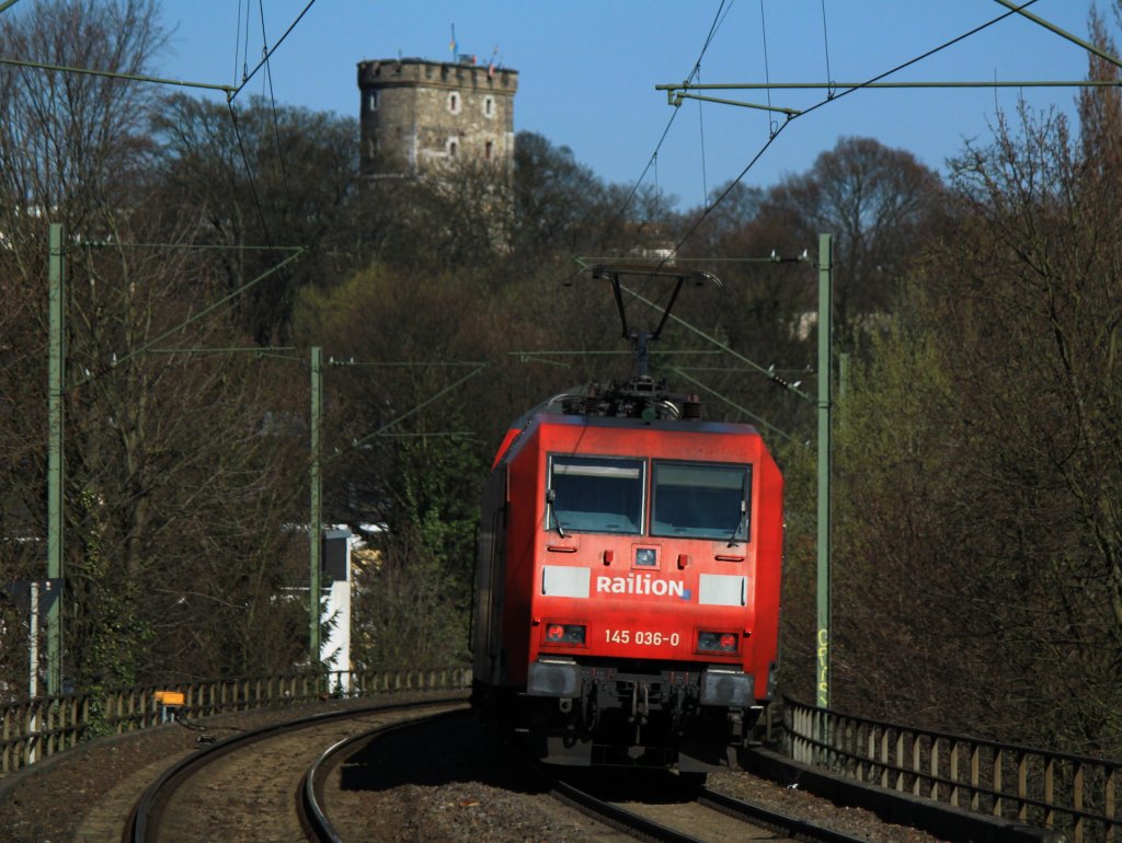145 036-0 schiebt am 21.03.2011 den RE4 vom Haltepunkt Schanz nach Aachen West.