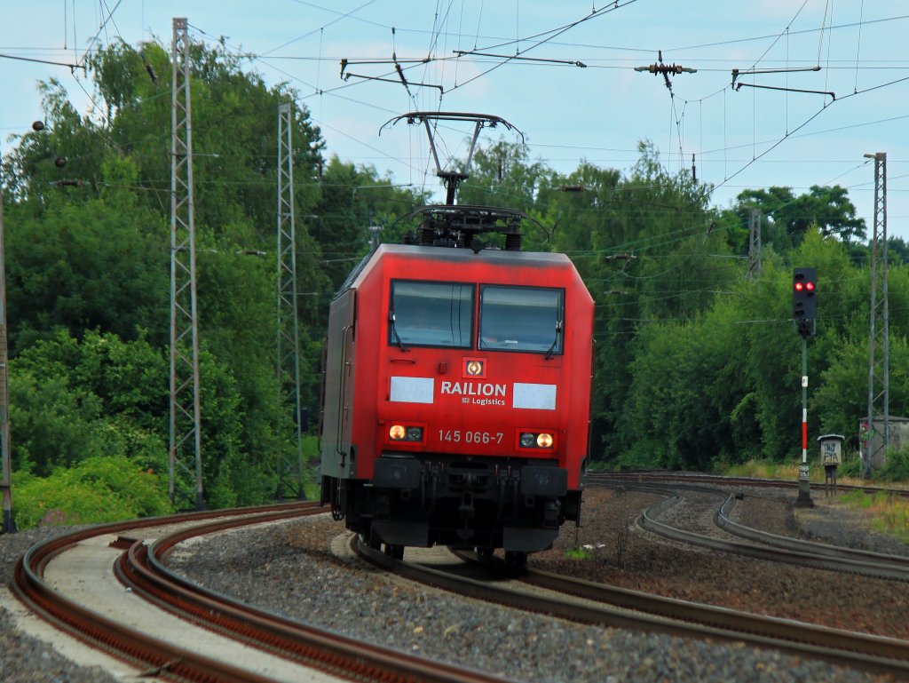 145 06-7 am 03.07.2012 als Lz auf der KBS 480 in der S-Kurve vor dem Bahnhof Eschweiler unterwegs Richtung Aachen.