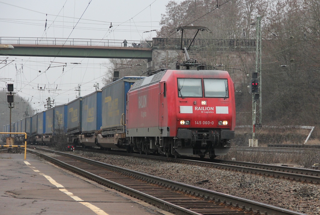 145 060-0 mit dem  Walter  in Fahrtrichtung Norden. Aufgenommen am 04.03.2012 in Eichenberg.