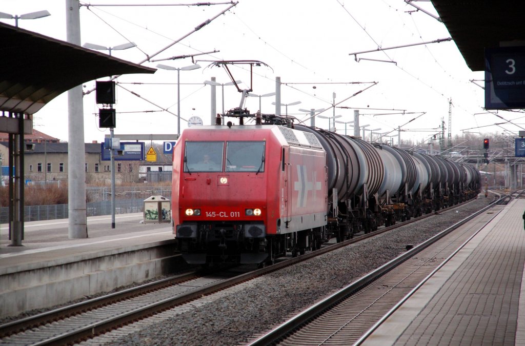 145-CL 011 der HGK bespannt am 27.02.10 einen Kesselwagenzug durch Bitterfeld Richtung Wittenberg.