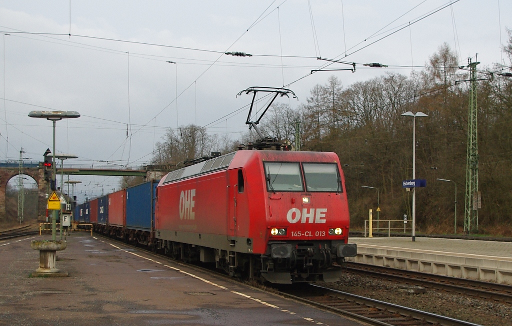 145-CL 013 der OHE mit Containerzug in Richtung Norden. Aufgenommen am 01.04.2011 in Eichenberg.