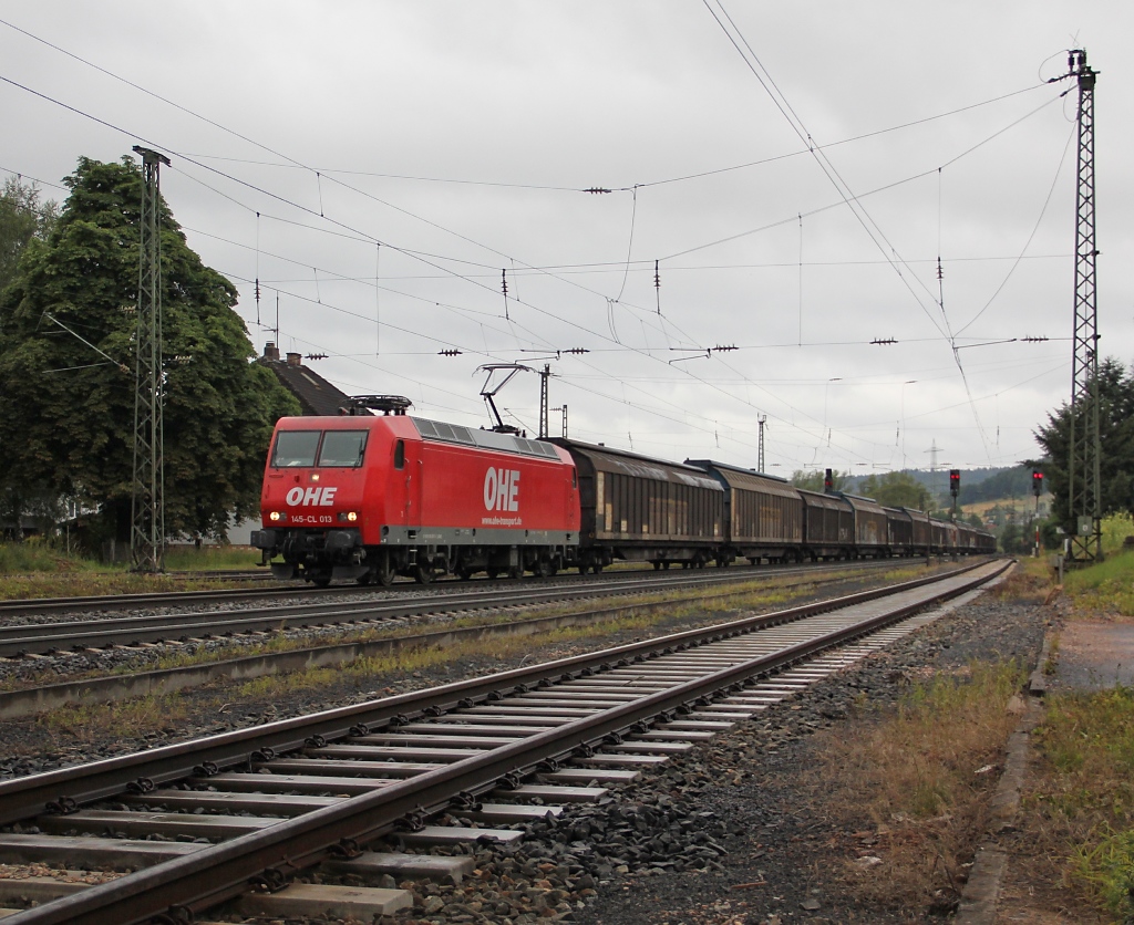 145-CL 013 der OHE mit H-Wagen Ganzzug in Fahrtrichtung Norden. Aufgenommen am 03.07.2011 in Mecklar.