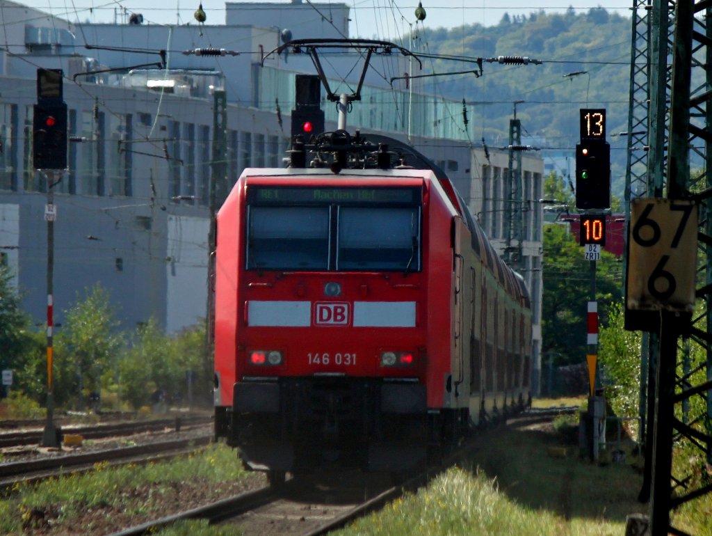 146 031 schiebt am 01.09.2012 RE1 ber die KBS 480 bei Rothe-Erde nach Aachen Hbf.