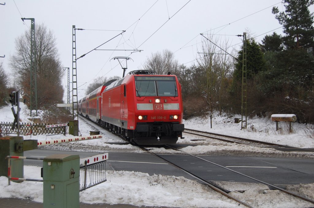146 108-6 mit RE nach Bremerhaven-Lehe, durchfhrt Loxstedt am 16.01.2010