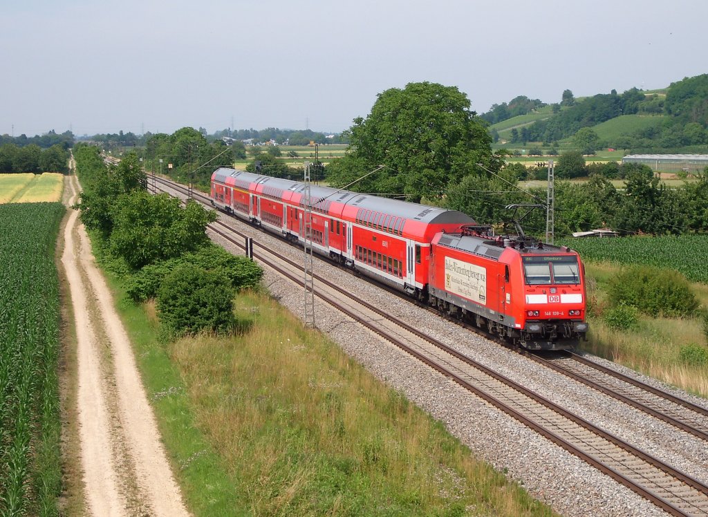 146 109-4 mit einem RE nach Offenburg am 01.07.10 bei Hgelheim.