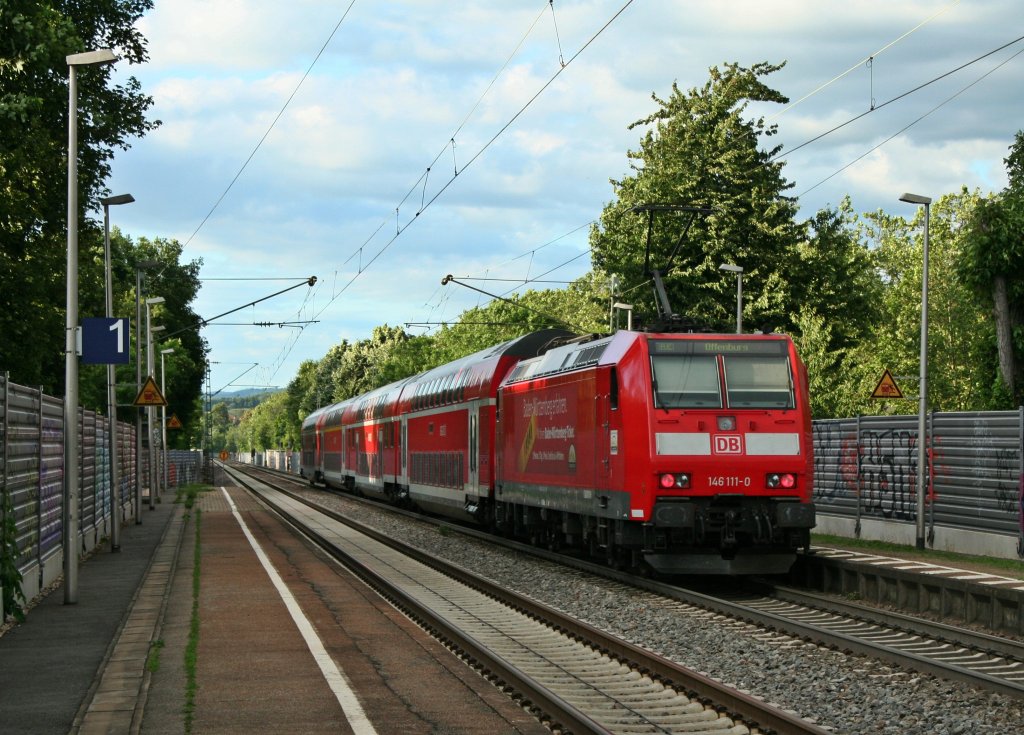 146 111-0 mit einem RE nach Offenburg am Abend des 22.06.13 bei der Durchfahrt in Freiburg-Herdern.