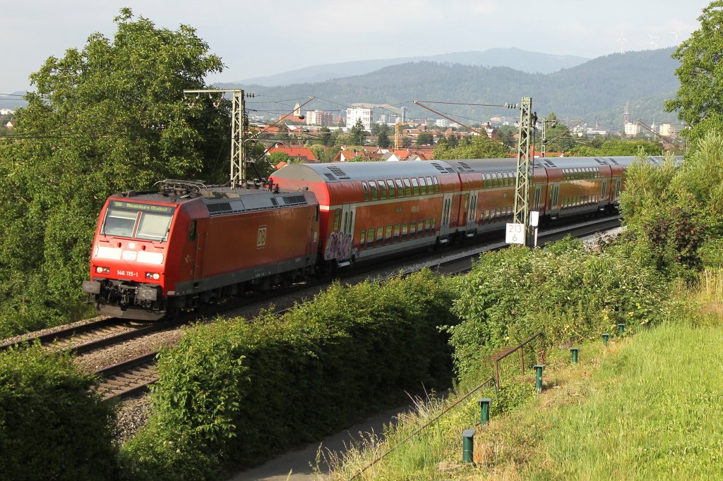 146 115-1 mit einer RB nach Neuenburg (Baden) am Sptnachmittag des 30.06.12 zwischen Freiburg St. Georgen und Ebringen in der Leutersberger Kurve.