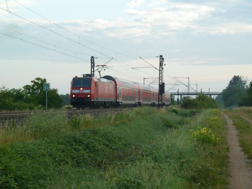 146 116-9 mit einem frhen RE nach Basel am 07.07.12 bei Hgelheim.