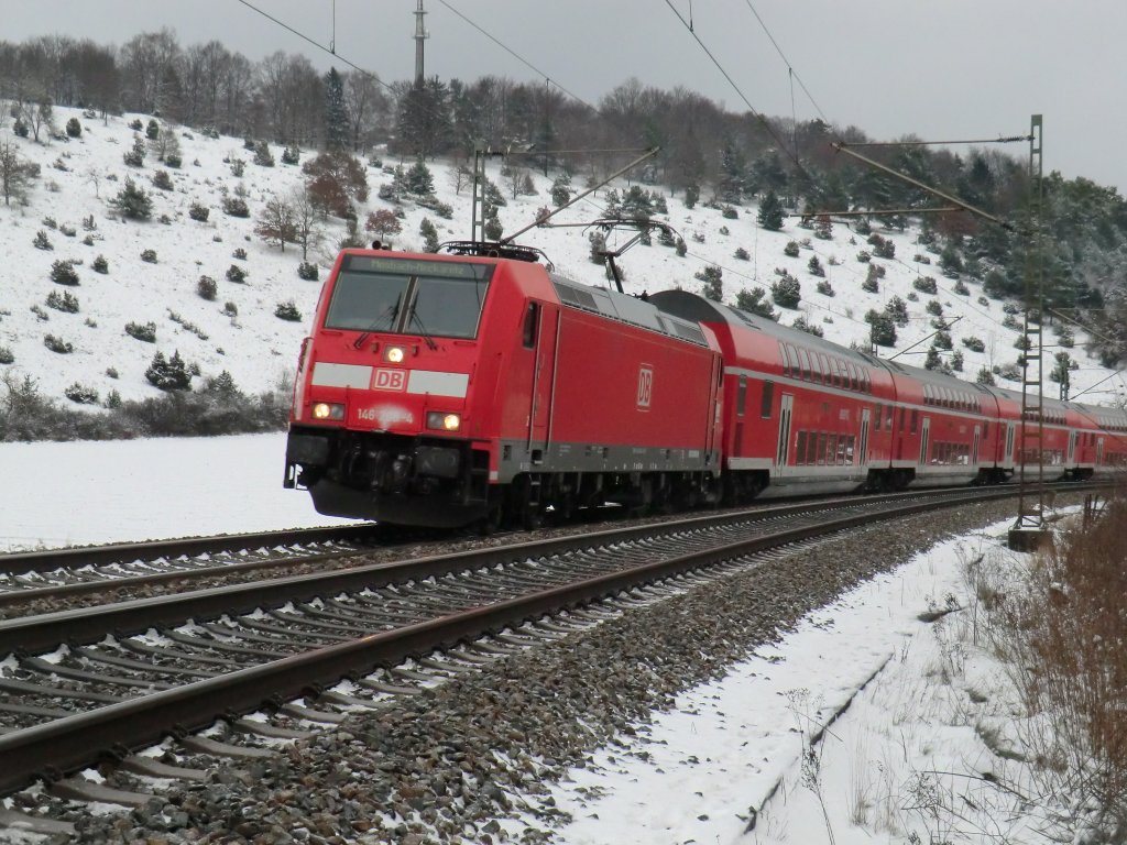 146-208 am 26.11.10 mit dem RE 19228 Ulm - Mosbach-Neckarelz bei Lonsee auf der Schwbischen Alb. 
 