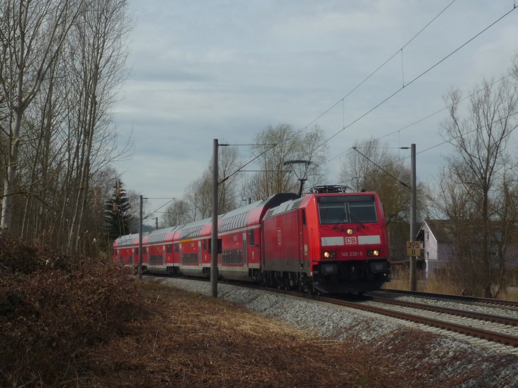 146 230-8 mit IRE 5185 Karlsruhe Hbf - Kreuzlingen/CH kurz hinter Radolfzell. 03.04.10
