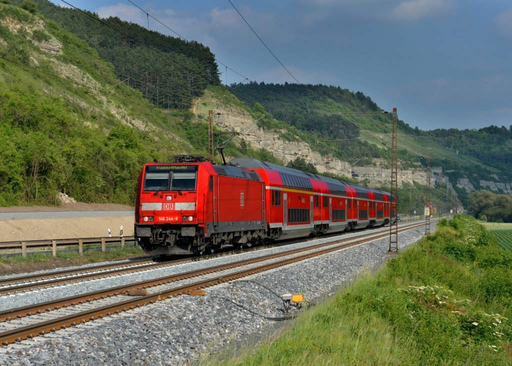 146 244 mit einem RE nach Frankfurt (Main) Hbf am 02.06.2012 bei Karlstadt.