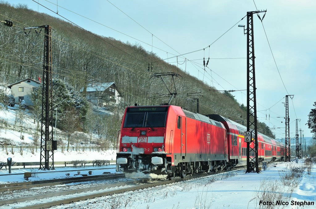 146 247-2 mit RE 4617 Frankfurt(Main)Hbf - Nrnberg Hbf,verlsst Gemnden/Main gen Wrzburg (Fotourlaub Gemnden 31.01.10)