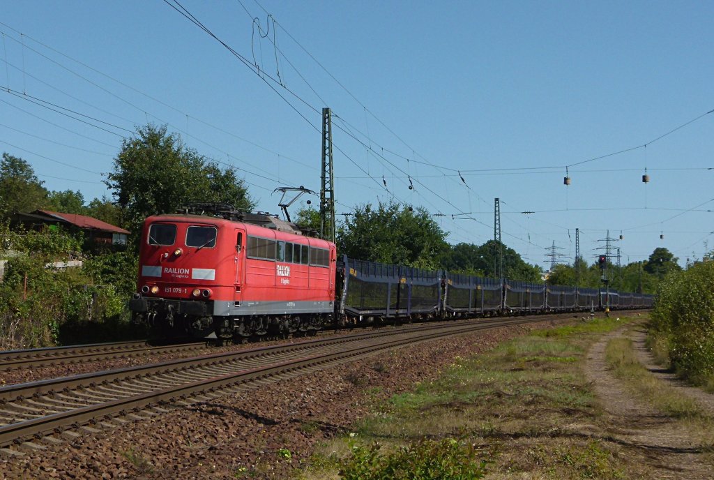 151 079-1 ist mit einem Leeren Autozug am 07.09.2012 in Kennelgarten