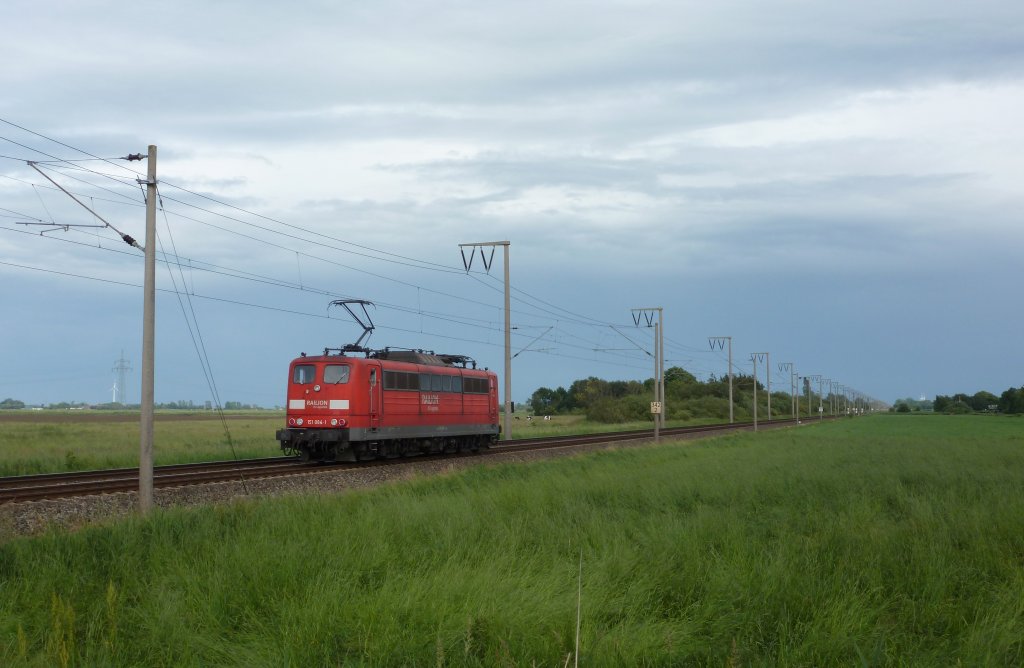 151 084-1 fuhr am 22.06.2012 Solo als Lokzug von Emden nach Drpen, hier bei Petkum.