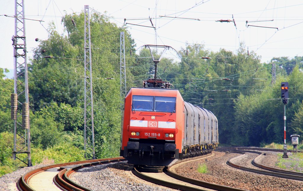 152 155-8 DB kommt durch Eschweiler-Hbf mit einem Coilzug aus Richtung Kln und fhrt nach Aachen-West bei Sonnenschein am 21.8.2012.