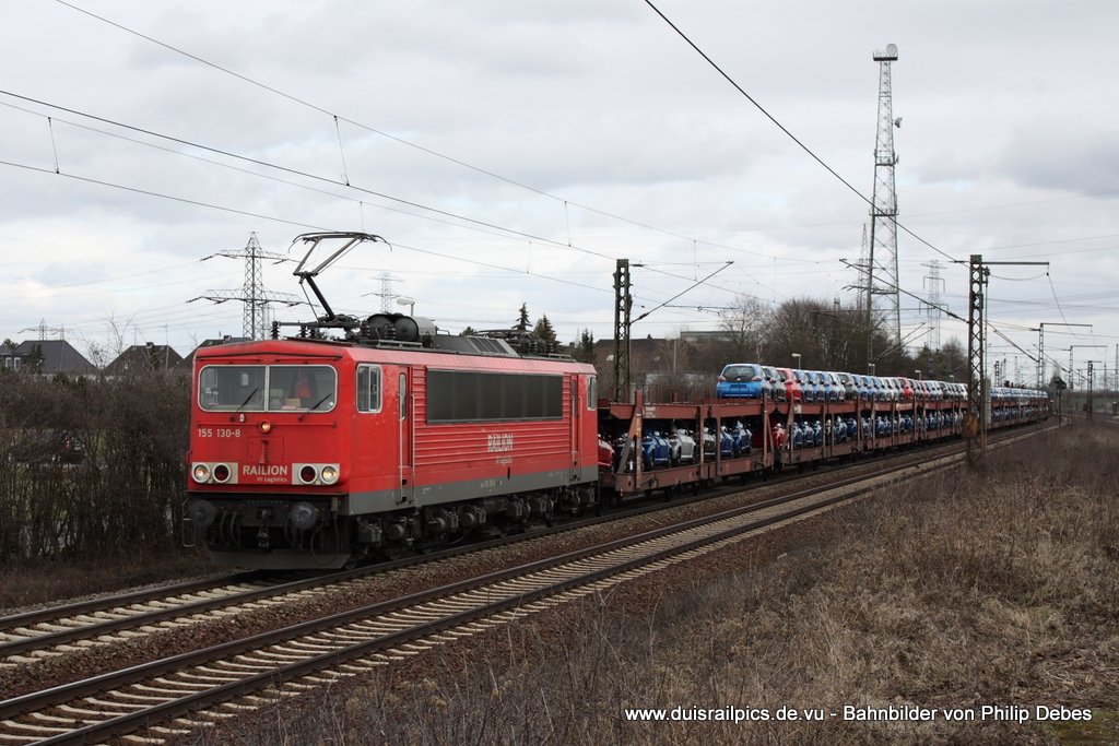155 130-8 (Railion DB Logistics) frht am 27. Februar 2010 um 13:13 Uhr mit einem Gterzug durch Ahlten