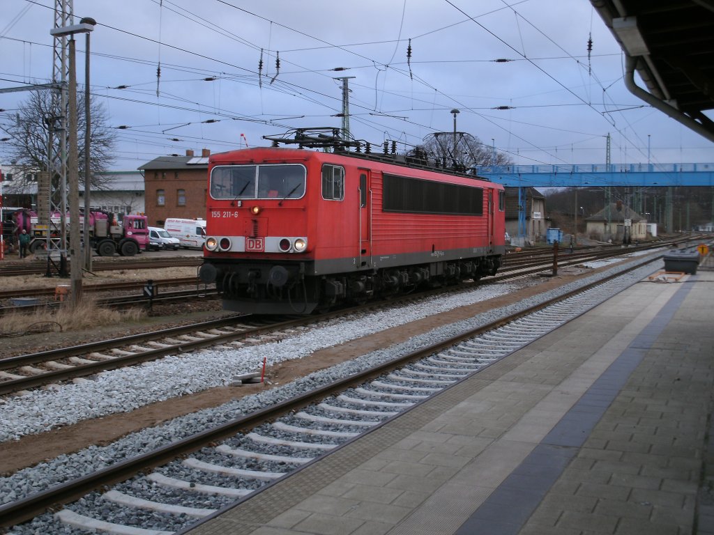 155 211 kam am 09.Februar 2011 als Lz von Mukran durch Bergen/R�gen gefahren.