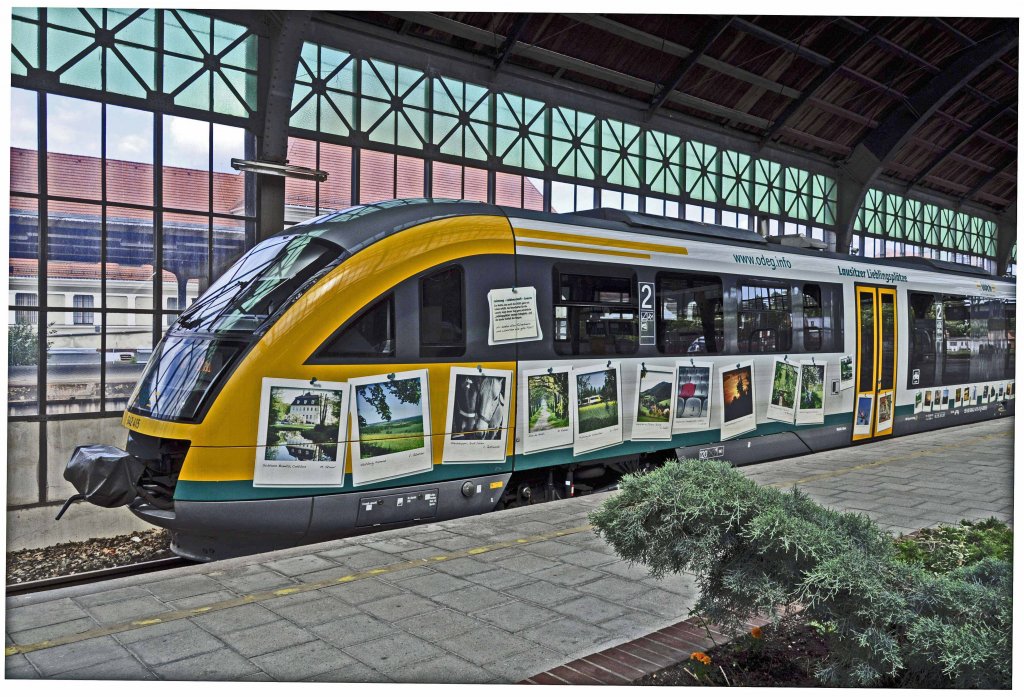 17.05.2012, Bf Grlitz. Der 642 415 der ODEG mit Werbung fr die Lausitz-Region auf der OE 65 vor der Ausfahrt nach Zittau