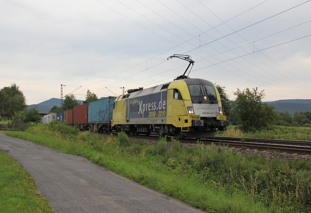 182 518-1 mit Containerzug in Fahrtrichtung Sden. Aufgenommen am 12.072011 kurz vor Eschwege West.