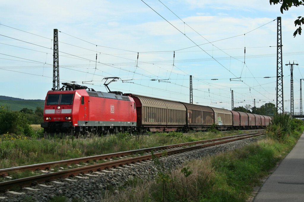 185 130-2 mit einem Stahlzug am 14.08.12 im nrdlichen Bahnhofsbereich von Mllheim (Baden).