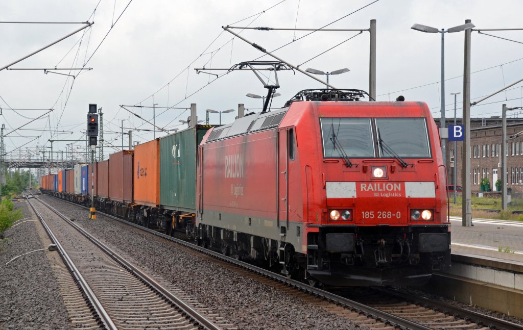 185 268 zog am 25.06.13 einen Containerzug aus Richtung Wittenberg kommend durch Bitterfeld Richtung Delitzsch.