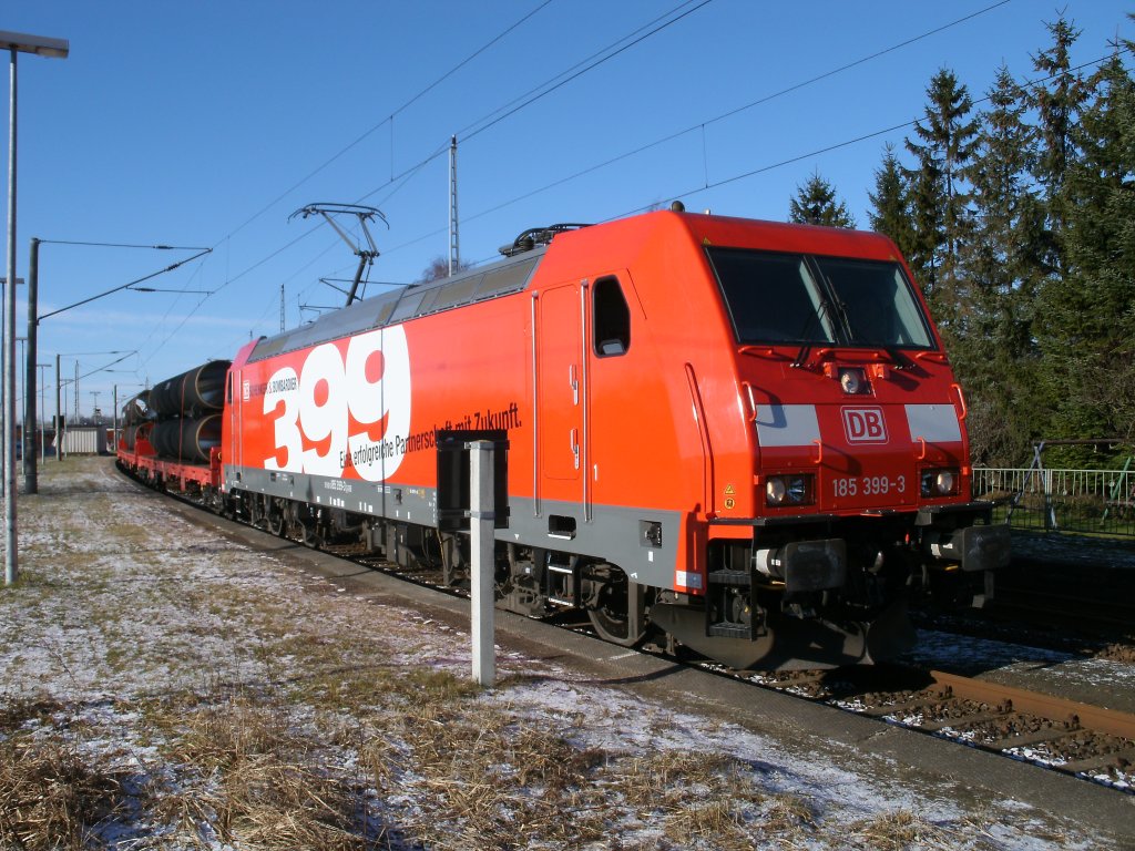 185 399 mit dem R�hrenzug von M�hlheim nach Mukran,am 12.Februar 2011,im Kreuzungs-und �berholgleis von Samtens.