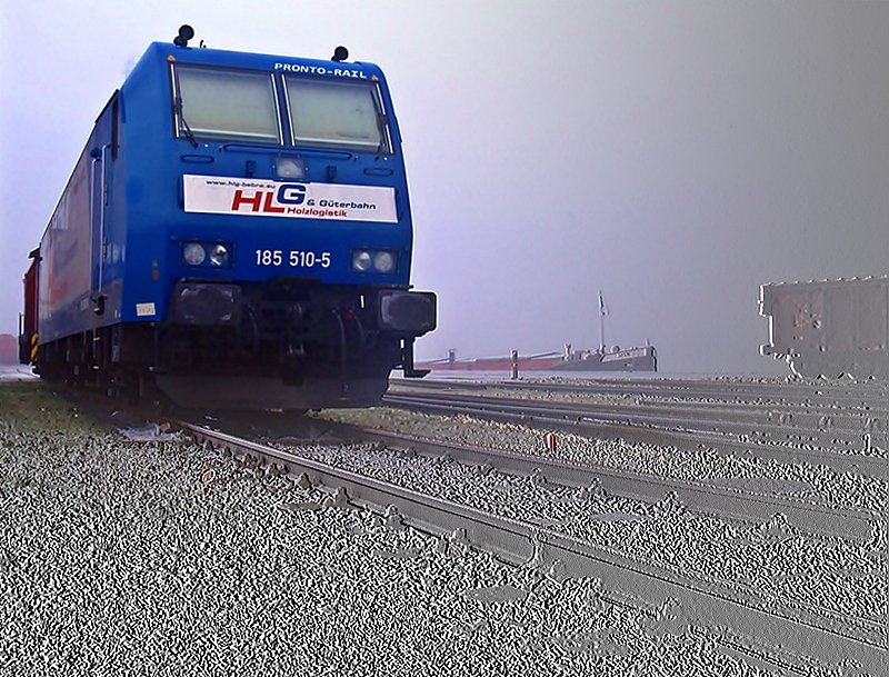 185 510 wartet auf die Fertigstellung ihres Holzzuges im Stadthafen Stralsund am 29.12.09