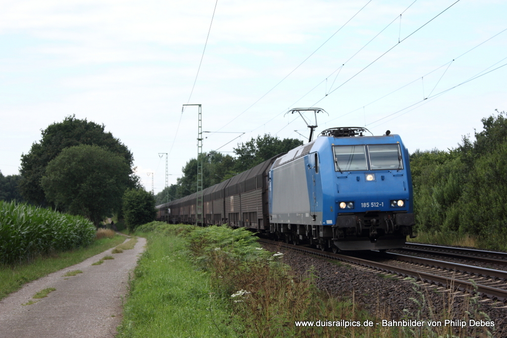 185 512-1 fhrt am 16. Juli 2012 um 9:36 Uhr mit einem Gterzug durch Osterholz Scharmbeck