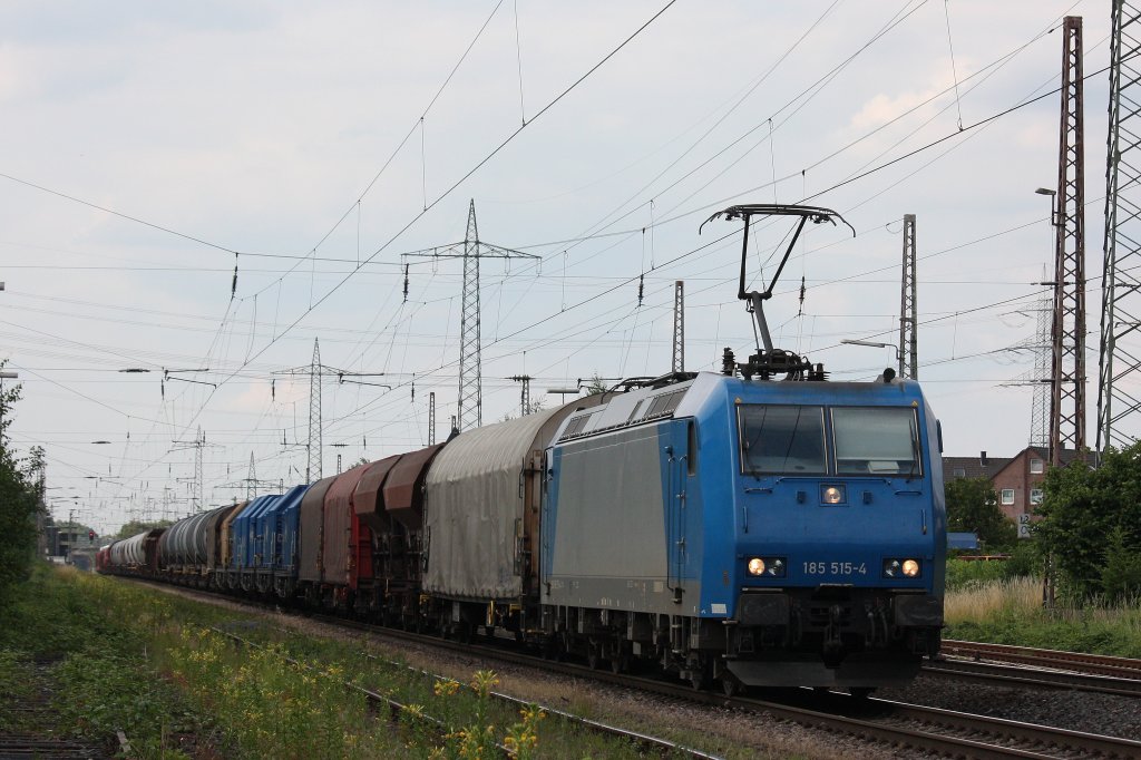 185 515 (i.E.fr DB Schenker Rail) am 4.7.12 mit einem gemischten Gterzug in Ratingen-Lintorf.