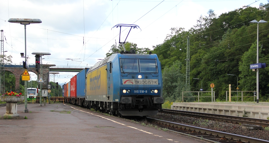 185 518-8 mit Containerzug in Fahrtrichtung Norden. Aufgenommen am 23.06.2011 in Eichenberg.