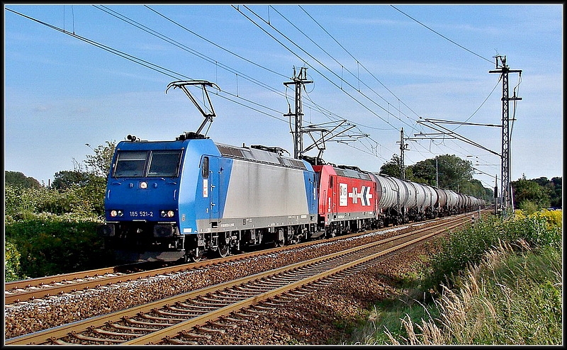 185 521-2 & 185 589-9  -beide HGK- lpendel aus Stendell.  Stralsund am 02.09.12 