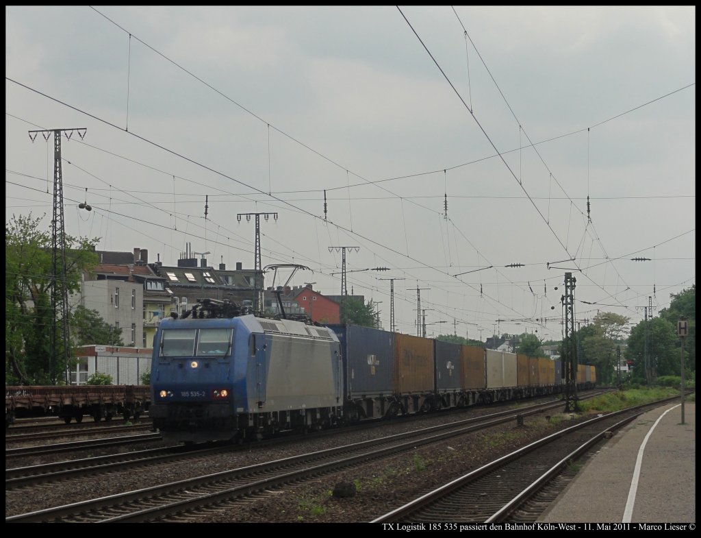 185 535 (TX Logistik) mit einem Containerzug in Kln-West (11.05.2011)