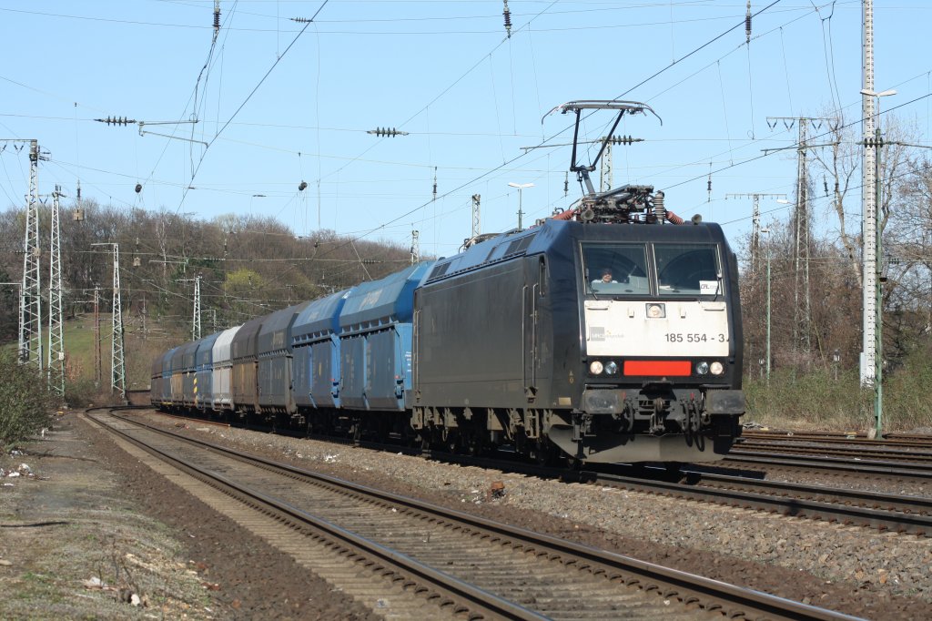 185 554-3 mit PKP Fals Wagen in Kln West am 19.03.11