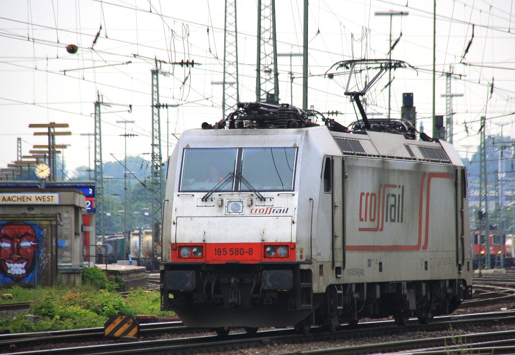 185 580-8  Jana  von Crossrail rangiert in Aachen-West bei Sonne und Wolken am Abend vom 11.6.2013.