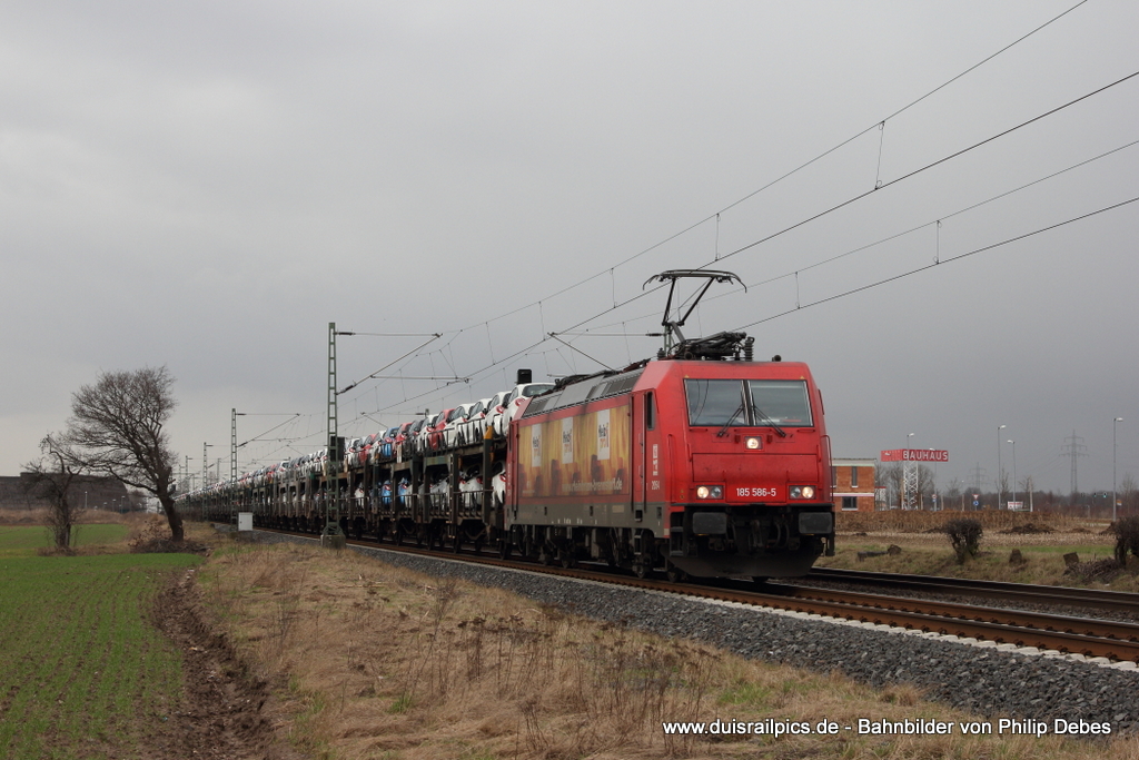 185 586-5 (HGK - Heizprofi) fhrt am 8. Mrz 2012 um 14:41 Uhr mit einem Gterzug durch Neuss Allerheiligen