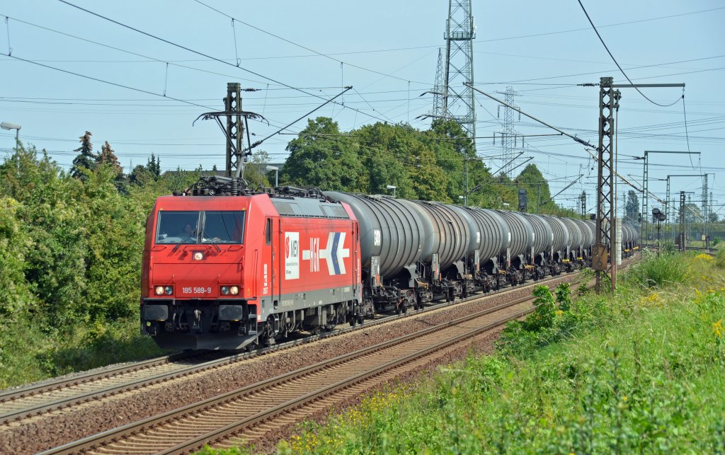 185 589 zog am 23.08.11 einen Kesselwagenzug durch Ahlten Richtung Hannover.