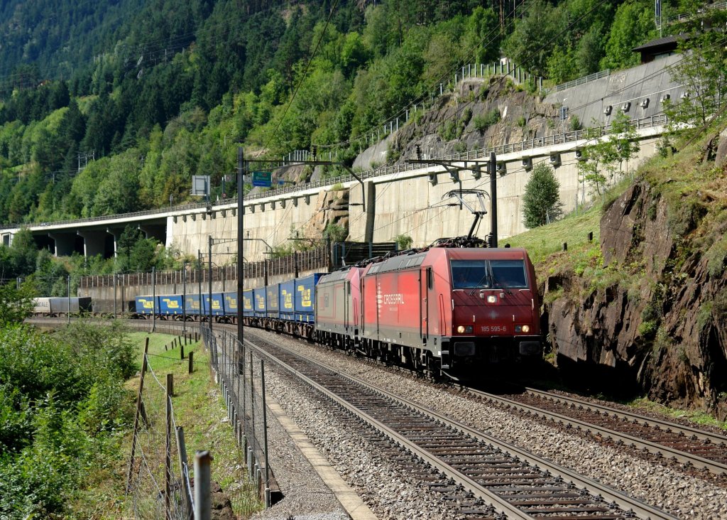 185 595 + 185 59x mit einem LKW-Walter am 29.08.2012 unterwegs bei Wassen.