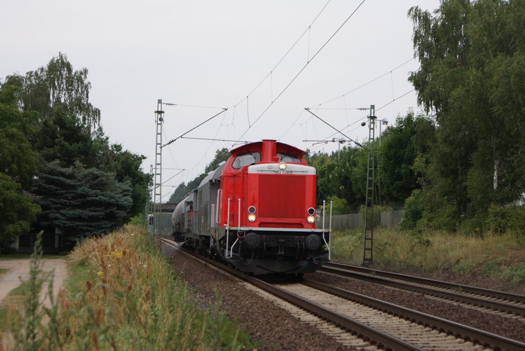 212 034-3 mit einem Spritzzug bei der Durchfahrt durch Dettingen am Main am Km 30,6 am 3.07.09
