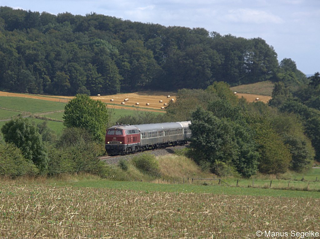 218 387 zieht einen Kurhessenbahnsonderzug von Korbach nach Brillon und konnte am 01.09.12 bei Rehna aufgenommen werden